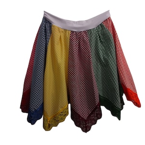 White Iyabo skirts. 9-color Gingham/Satin skirt, 9-color Gingham flat skirt. 9-color Gingham skirt with 9 peaks.