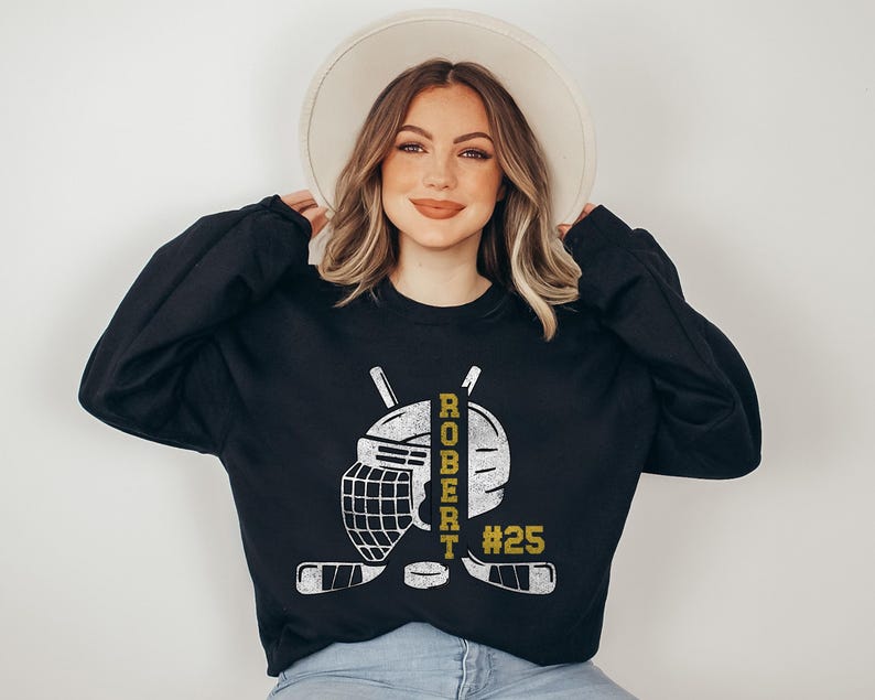 Personalized hockey hoodie with player name, number, and team colors. Perfect gift for players, fans, and teams, available for kids and adults!