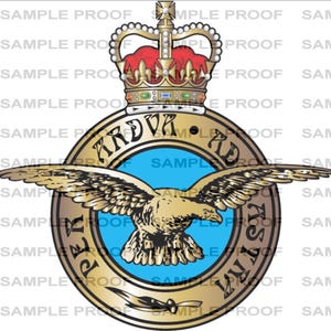 May include: A circular emblem featuring a golden eagle with outstretched wings, a blue center, and a crown at the top. The emblem has text around the edges and the words "SAMPLE PROOF" repeated throughout the background.