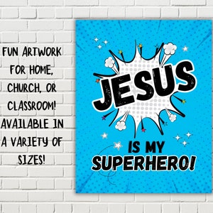 Op de afbeelding: Een blauwe en witte comic-stijl print met de tekst "JESUS IS MY SUPERHERO!" in zwarte letters. Het woord "JESUS" staat in een groot, vet lettertype en is omgeven door een witte spraakballon met zwarte stippen. De achtergrond is helderblauw met witte sterren.