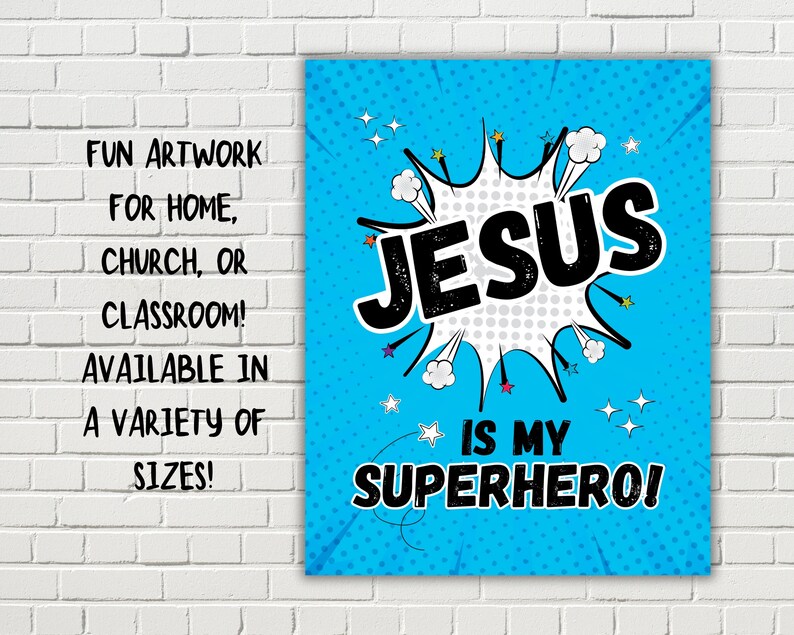 Op de afbeelding: Een blauwe en witte comic-stijl print met de tekst "JESUS IS MY SUPERHERO!" in zwarte letters. Het woord "JESUS" staat in een groot, vet lettertype en is omgeven door een witte spraakballon met zwarte stippen. De achtergrond is helderblauw met witte sterren.