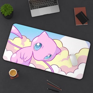 May include: A pink and white mousepad with a cartoon pink and blue creature with a long tail floating on clouds. The creature has large blue eyes and a pink body.