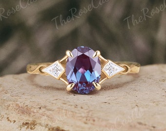 Oval Alexandrite Engagement Ring with Kite Cut Moissanite, Yellow Gold Bezel Setting
