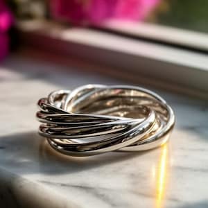 Intertwining Sterling Silver Ring: Unisex Twisted Bands