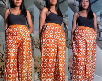 African Print Adire Pallazo Pants. Side Pockets side elastic waist lounge wear. Breathable Cotton stylish bootcut pants