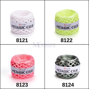 May include: Four skeins of yarn in different colors: white, yellow, pink, and gray. Each skein has a label that reads "YarnArt METALLIC CLUB". The skeins are numbered 8121, 8122, 8123, and 8124.