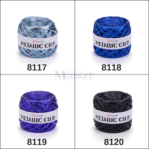 May include: Four spools of metallic yarn in different colors: light blue, blue, purple, and black. Each spool has a white label with the text "YarnArt METALLIC CLUB" and a number: 8117, 8118, 8119, and 8120.