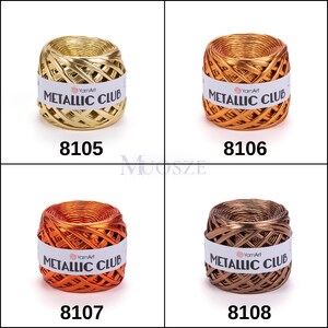 May include: Four spools of metallic yarn in gold, copper, orange, and brown. Each spool has the text "YarnArt Metallic Club" printed on a white label.