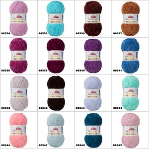 May include: A collection of 12 balls of yarn in various colours, including pink, blue, purple, brown, and teal. Each ball is labelled "Himalaya Dolphin Baby" and has a unique number.