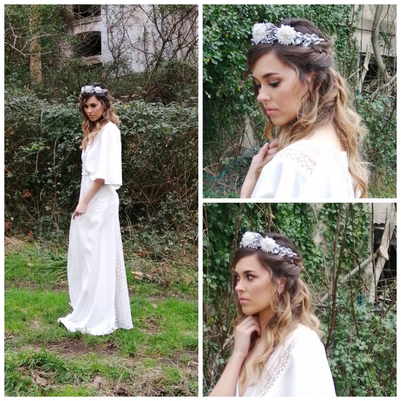 In this image we can see the bride with her bridal tiara crown with rhinestones, porcelain leaves and silver-colored crystals.