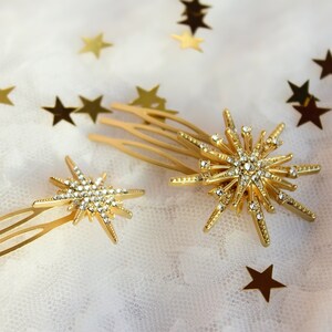 In this image you can see the bridal star bobby hair pins in gold, set of 2