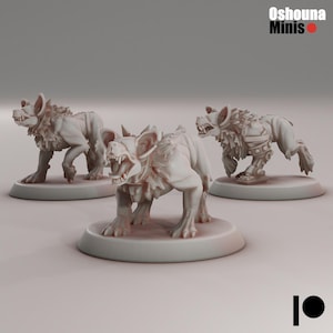 May include: Three grey painted miniature figurines of snarling, wolf-like creatures with detailed fur and teeth. The figures are posed on circular bases.