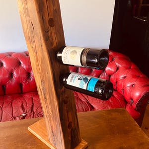 Wine rack made of historic oak timber frame