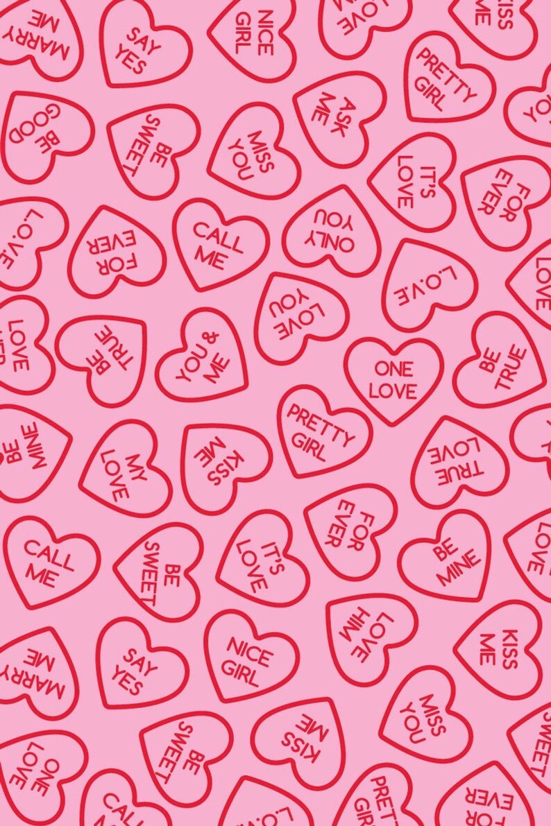 May include: A pink background with a repeating pattern of red heart-shaped candies with various messages on them. The messages include "Be Mine", "Say Yes", "Love", "Kiss Me", "Call Me", "Miss You", "True Love", "Nice Girl", "Pretty Girl", "Be Sweet", "For Ever", "One Love", "You & Me", "It's Love", and "Ask Me".