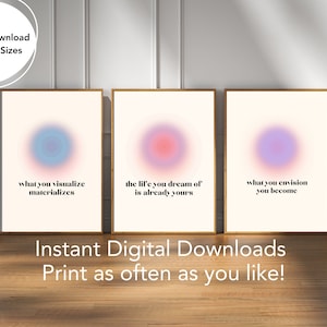 May include: Three printable wall art prints with motivational quotes and abstract gradient circles in pink, blue, and purple. The quotes are "what you visualize materializes", "the life you dream of is already yours", and "what you envision you become".