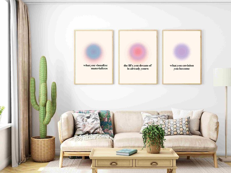 May include: Three framed prints with motivational quotes and abstract colourful circles. The quotes are "what you visualise materialises", "the life you dream of is already yours", and "what you envision you become".
