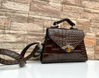 Brown clutch bag. Dark brown handbag