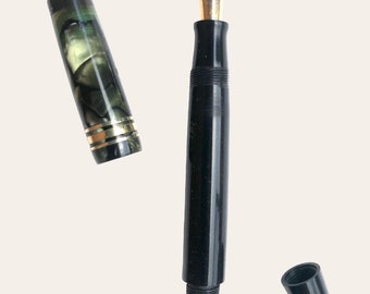 Vintage HELIOS celluloid fountain pen with mottled green cap and bottom button. vintage fountain pen, retro fountain pen