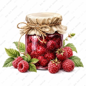 May include: A clear glass jar filled with bright red raspberries, topped with a beige fabric cover secured by a tied twine string. The jar is surrounded by several fresh green raspberry leaves and loose red raspberries on a white background.