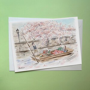 Coppia romantica su un barchino a Cambridge