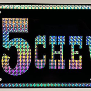 Targa Chevy METAL 55 12 x 6 nera con scritta PRISM retrò