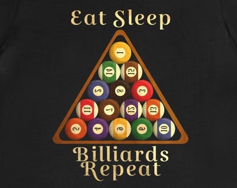May include: Black t-shirt with the text "Eat Sleep Billiards Repeat" in gold lettering. A triangular rack of billiard balls is shown in the center of the shirt.