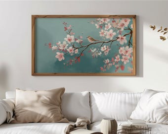 Peut inclure: Une impression d'art encadrée représentant une peinture à l'aquarelle d'un oiseau perché sur une branche fleurie. L'œuvre présente de délicates fleurs roses et des accents rouges sur un fond turquoise. Le cadre en bois ajoute une touche naturelle.
