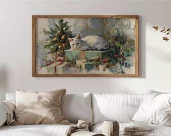 May include: A framed painting depicts a white cat resting on a stack of gifts, with a small Christmas tree and holly. The artwork has a vintage aesthetic with soft colors and a wooden frame, evoking a cozy holiday scene.