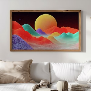 May include: A framed art print featuring a vibrant, abstract landscape. The artwork showcases colorful, textured hills in shades of red, orange, teal, and purple, with a large yellow sun against a dark red sky. The frame is made of wood.