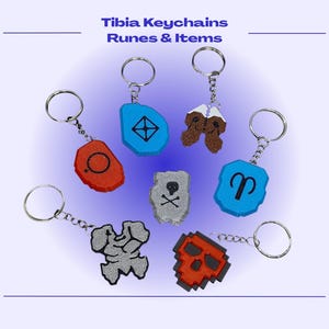 May include: A collection of seven Tibia keychains featuring various rune and item designs. The set includes shapes in red, blue, grey, and brown, each attached to a silver metal keyring. The text Tibia Keychains Runes & Items is visible.