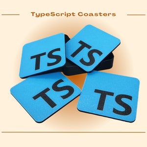 May include: Four blue square coasters with the letters "TS" in black on each coaster. The coasters are stacked on top of each other.