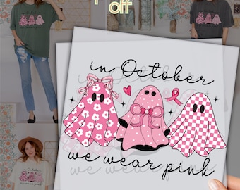 May include: A graphic design featuring three pink ghost characters with bows and patterns, accompanied by the text "in October we wear pink". The design includes a pink ribbon and heart, suitable for DTF printing.