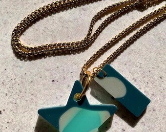 Double Shape Resin Pendant Necklace. Coastal Ocean Star and Bar Drops. Stainless Steel Gold Chain. Modern Alternative Jewellery.
