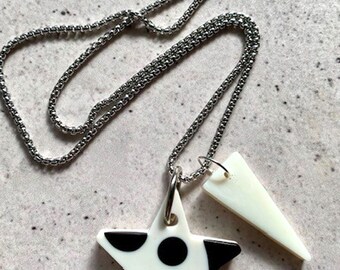 Double Shape Resin Pendant Necklace. Black and Ivory Star and Triangle Drops. Stainless Steel Silver Chain. Modern Alternative Jewellery.