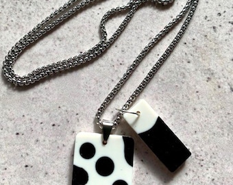 Double Shape Resin Pendant Necklace. Black and Ivory Bar Drops. Stainless Steel Silver Chain. Modern Alternative Jewellery.