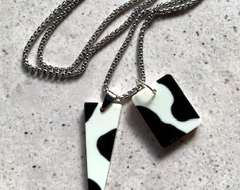 Double Shape Resin Pendant Necklace. Black and Ivory Triangle and Bar Drops. Stainless Steel Silver Chain. Modern Alternative Jewellery.
