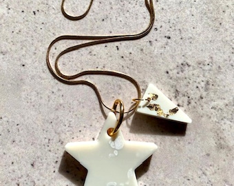 Double Shape Resin Pendant Necklace. Ivory Star and Triangle Drops. Stainless Steel Gold Chain. Modern Alternative Jewellery.
