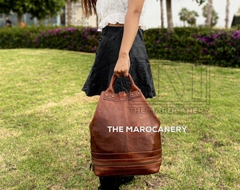 Versatile Convertible Leather Backpack: Top Handle and Drawstring options for the ultimate on-the-go bag