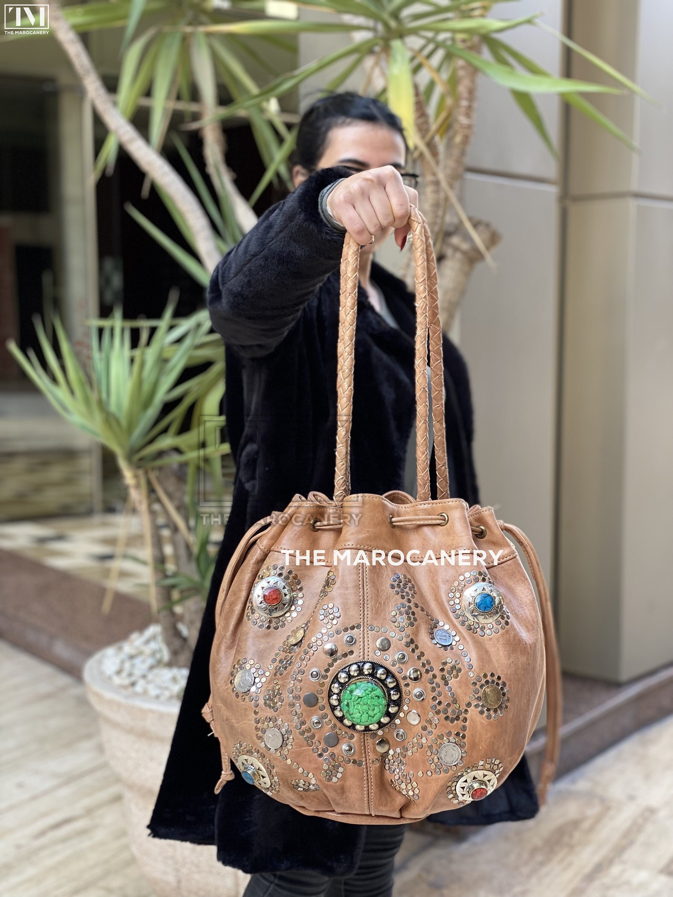 Bag with studs underneath shop