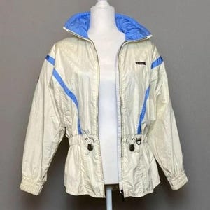 Vintage Descente Women&#39;s Ski Jacket Size XS Water-Resistant Cream & Blue Adjustable Waist Hidden Hood