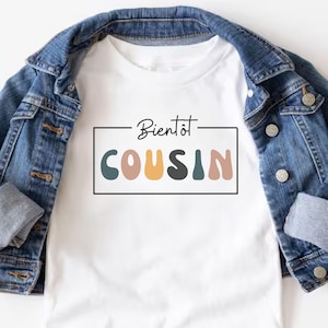 Schwangerschaftsmitteilung in französischer Sprache. Zukünftiger Cousin Geschenk auf Französisch. Bald Cousin zu sein. Kinder T-shirt. Babymitteilung Geschenk | Bientôt Cousin.