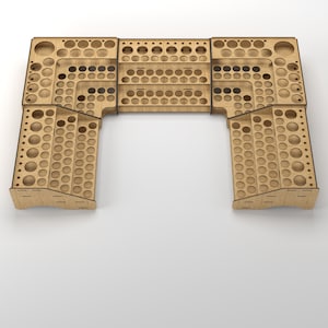 May include: A wooden paint rack with multiple shelves and rows of circular holes for storing paint bottles. The rack is in the shape of a U and is made of light brown wood.