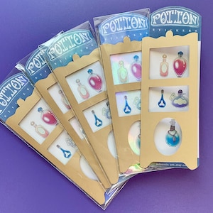 May include: Set of five sticker sheets featuring colorful potion bottles with iridescent foil accents. Each sheet has a different design and includes the text "Potion Stickers".
