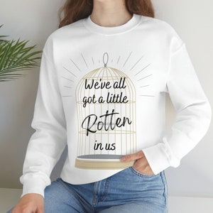 Plated Prisoner Series, Raven Kennedy, Auren Slade, Commander Rip King Rot, Gild Gleam Glint Glow Goldfinch, Women's Unisex Heavy Sweatshirt