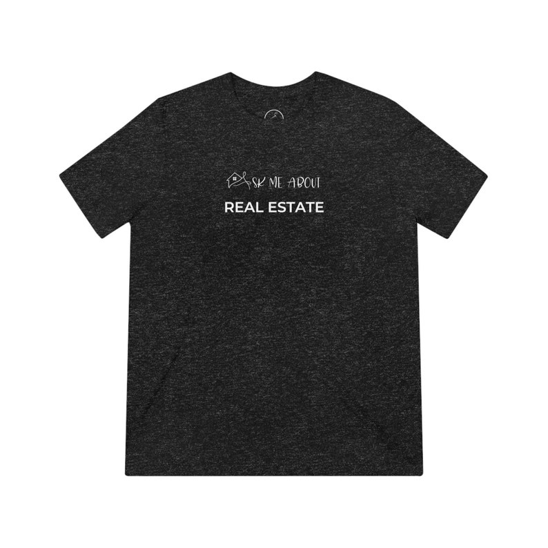 May include: A dark grey t-shirt with the text "Ask me about real estate" and a small house icon.