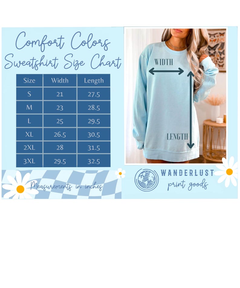 以下が含まれることがあります： 水色のComfort Colorsスウェットシャツとサイズチャート。サイズチャートは、Sから3XLまでのサイズで、幅53.3〜74.9cm、長さ69.9〜82.6cmの寸法をcmで表示しています。「Wanderlust print goods」の文字も表示されています。