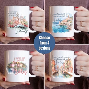 May include: Four white ceramic mugs with different watercolor designs of Italian cityscapes. Each mug features the text "I am tired of not waking up in Italy".