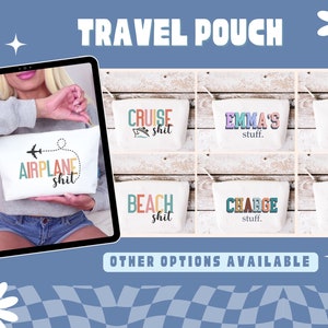 May include: White travel pouches with various text designs. One pouch reads "AIRPLANE shit" with an airplane graphic. Other pouches say "CRUISE shit", "EMMA'S stuff", "POOL shit", "BEACH shit", "CHARGE stuff", and "MAKEUP stuff".