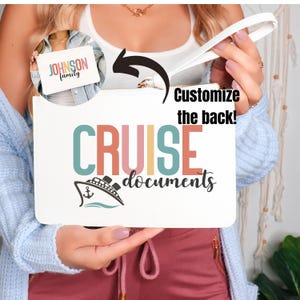 May include: White zippered pouch with a colorful "CRUISE documents" design and a small cruise ship graphic. The back of the pouch can be customized.