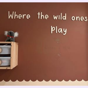 Where the wild ones play nursery sign wall décor.